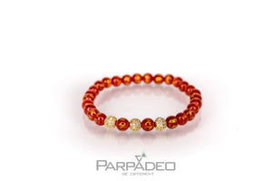 Red Sanskrit Bracelet by Parpadeo. Designed and handmade in Israel by Martin Greenberg