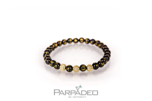 Golden Sanskrit Bracelet by Parpadeo. Designed and handmade in Israel by Martin Greenberg